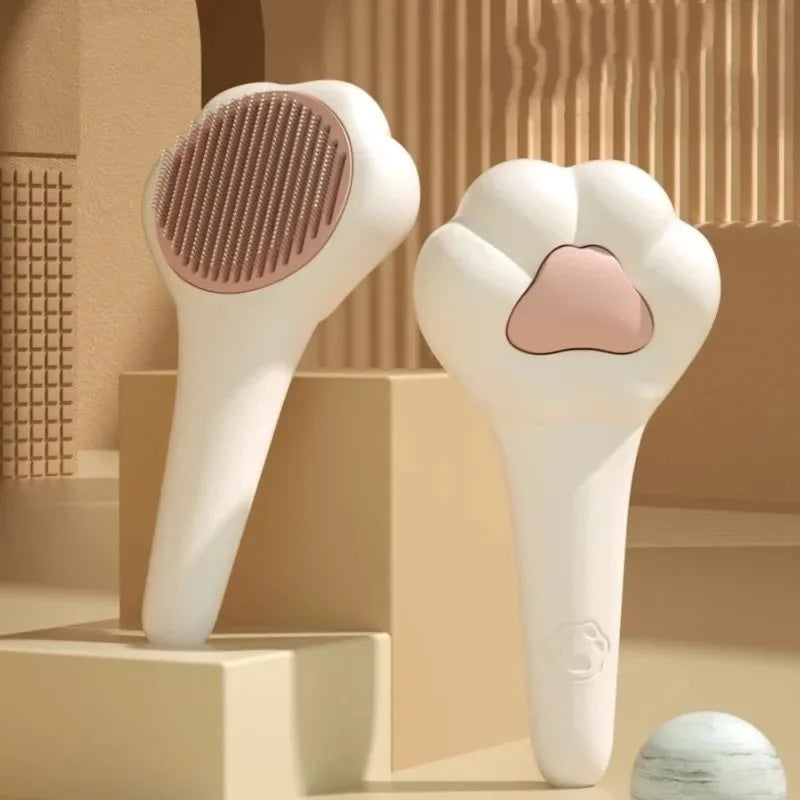 Two pet grooming brush models with white handles and brown/pink bristle pads