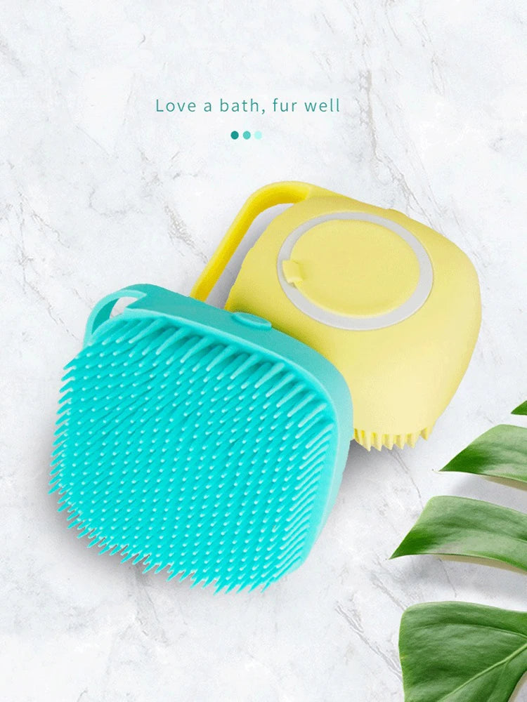 Teal and yellow pet bath massage gloves with circular top caps and rubber bristles