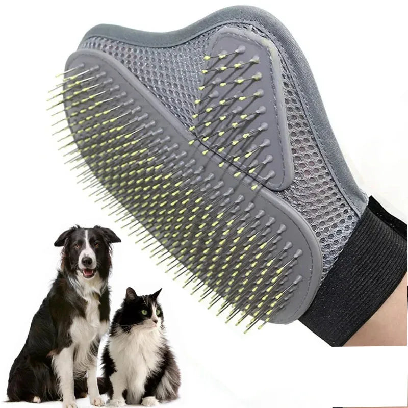 Grey pet grooming mitt with flexible needle bristles on a heart-shaped palm pad
