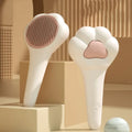 Pair of pet grooming brushes with white handles and round brown/pink bristle heads