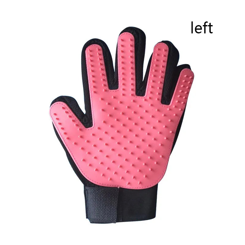 Pink silicone grooming glove with black wrist strap and massage nubs