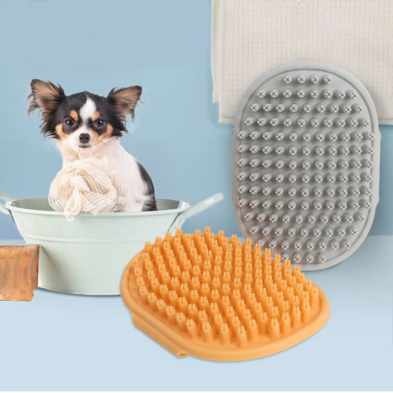 Gray rubber pet bath brush with oval textured massage nubs and side handle