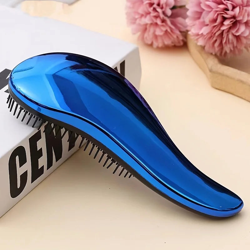 Pet grooming brush with glossy blue body and black comb teeth, oval design.