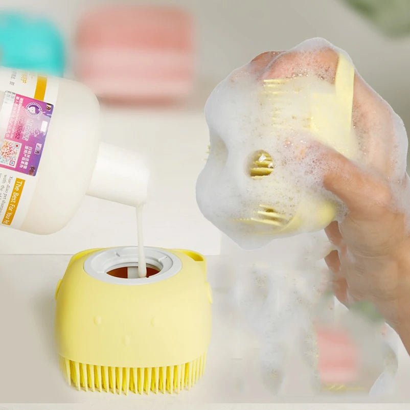 Yellow pet bath massage glove with circular top cap and rubber bristles