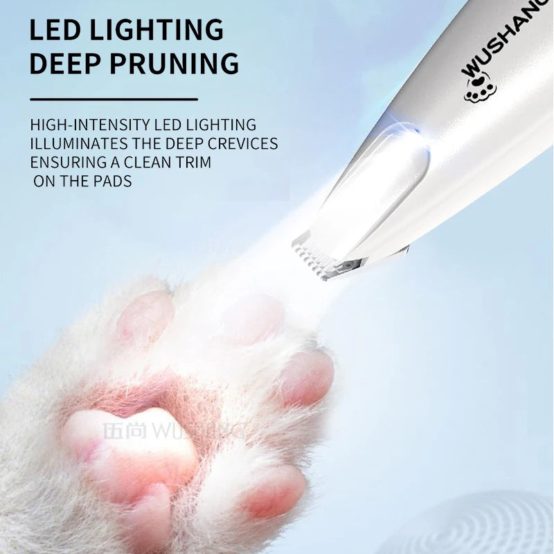 Pet electric grooming trimmer with LED light, white, angled head near fur